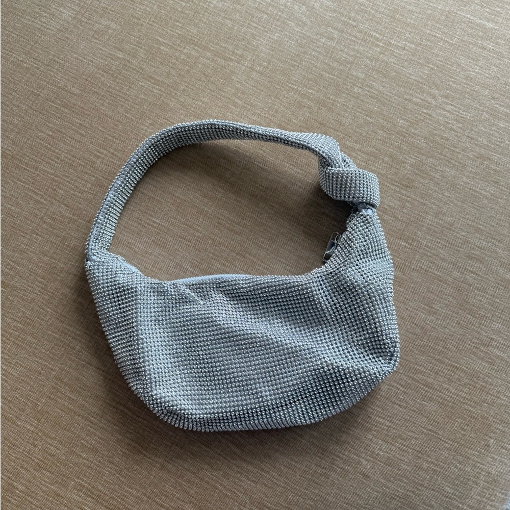 Revolve silver shoulder bag / clutch